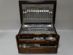 A SILVER ONE HUNDRED PIECE CANTEEN OF CUTLERY, the mahogany case having a stepped and hinged lid
