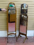 TWO VINTAGE CHEVAL DRESSING MIRRORS, one walnut, one oak, (the former requires leg repair), 165