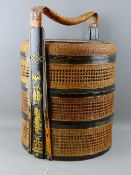 A VINTAGE CHINESE WICKERWORK WEDDING BASKET with carved gilt highlighted detail to the handle, 36.