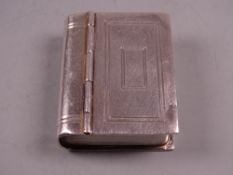 A SILVER SNUFF BOX in the form of a book, Birmingham 1967