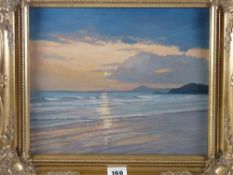 KENNETH H GRESTY oil on board - shore scene with Criccieth Castle in the distance at sunset,