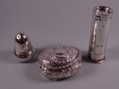 A SMALL OVAL SILVER PATCH BOX with all over scrolled and floral decoration, Chester 1896, a small