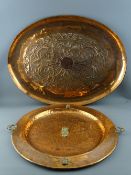 AN ARTS & CRAFTS STYLE OVAL COPPER TRAY and one other having embossed central interlace design and
