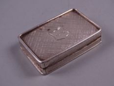 AN OBLONG SILVER SNUFF BOX with hinged lid and raised rim, Birmingham 1839