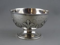 A SILVER PEDESTAL ROSE BOWL with Gothic type decoration, Sheffield 1919, 7 troy ozs, 11 cms high,