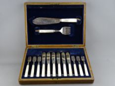 AN OAK CASED SILVER WITH MOTHER OF PEARL HANDLED FISH KNIVES & FORKS SET WITH SERVERS, Sheffield