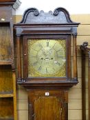 A CIRCA 1800 OAK LONGCASE CLOCK having a brass dial and eight day movement by Michael Thomas,
