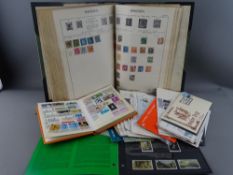 Vintage postage stamp album and contents and one other, a small quantity of first day covers and