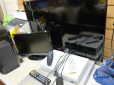 Large Samsung TV, a small Grundig TV and a parcel of home entertainment equipment - Sky box, DVD