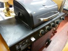 Excellent Uniflame gas powered BBQ, model no. GBC1440WPE-U and two metal framed garden recliners