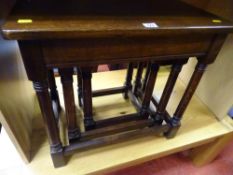 Polished wood nest of three tables