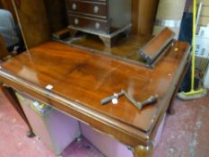 Polished extending dining table on pad feet with winder