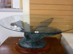 Glass topped oval coffee table with carved Pegasus sculptured base, signed 'Casasola'