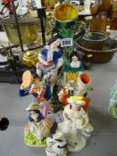 Group of six Staffs pottery figural ornaments
