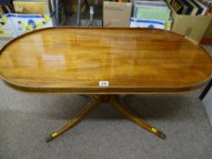 Regency style oval topped coffee table