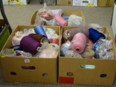 Three boxes of knitting machine wool and yarn