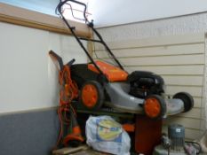 Flymo Sprint XT45 petrol self-propelled lawnmower and a Flymo garden strimmer E/T