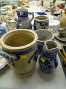 Six items of German cobalt decorated stoneware pottery