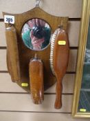Wall mounted mirror and clothes brush set