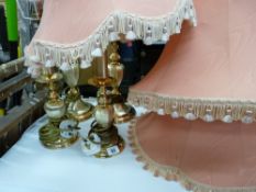 Parcel of four brass effect lamps, matching and in two sizes, with shades E/T