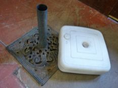 Metal parasol base and a plastic parasol base