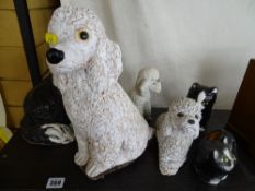 Collection of various composition cats and dogs