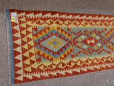 Vegetable dye wool Choli Kilim carpet runner, brightly coloured with central block pattern and zig
