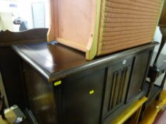 Polished wood linenfold blanket box and a loom style bedside cabinet