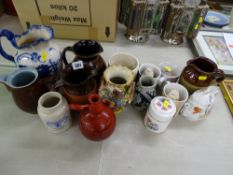 Mixed collection of pottery jugs etc