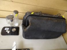 Vintage Gladstone type vanity case containing three silver topped bottles and additional lid etc