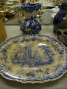 Large Ironstone blue and white Willow pattern jug and a large meat platter 'Athens' pattern (