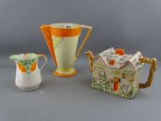 Myott & Sons Art Deco jug and one other with an Arthur Wood cottage teapot