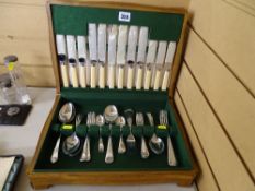 Oak cased canteen of chrome cutlery