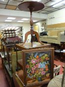 Reproduction mahogany two tier side trolley with single drawer and slide-out tray, an embroidered