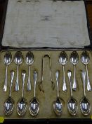 Cased set of twelve Mappin & Webb silver teaspoons and sugar tongs, Sheffield 1922