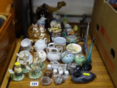 Parcel of cabinet ornaments including Swarovski style glass, frog and rabbit figurines etc