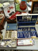 Collection of mainly cased cutlery including Crown Derby pistol shaped handled knives with a vintage