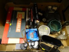 Box of white metal ornamental peacocks, cased set of binoculars, porcelain etc