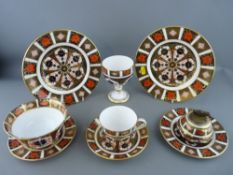 Nine pieces of Royal Crown Derby 1128 pattern china including a table lighter