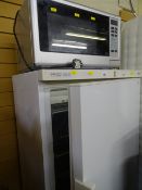 Proline seven drawer upright freezer and a Prestige SC2AS 900w microwave oven E/T