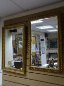Two gilt framed bevelled wall mirrors