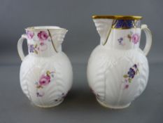 Two Coalport porcelain Caughley mask head jugs