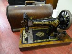 Wooden cased manual Singer sewing machine