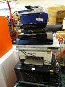 Black Panasonic microwave oven and a quantity of home entertainment boxes including DVD players