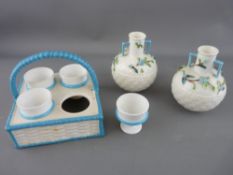 Possibly Worcester basket with eggcups and a pair of similarly styled vases