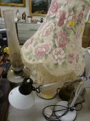 Anglepoise lamp, two vintage style paraffin lamps and a large modern relief moulded lamp with shade