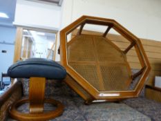 Modern octagonal glass topped coffee table with Bergere under tier and a modern bentwood style