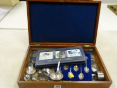 Mahogany cutlery box with mixed flatware, coins, commemorative coinage contents