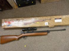 Boxed 0.22 calibre Crossman air rifle with fitted SMK 4x28 sights