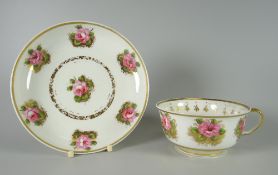 A SWANSEA PORCELAIN BREAKFAST CUP & SAUCER with ear loop handle, gilded and decorated with